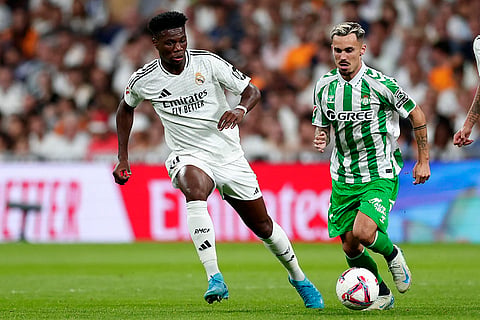La Liga 2024-25 Real Madrid vs Real Betis: Real Madrid's Aurelien Tchouameni, left, challenges Betis' Pablo Fornals
